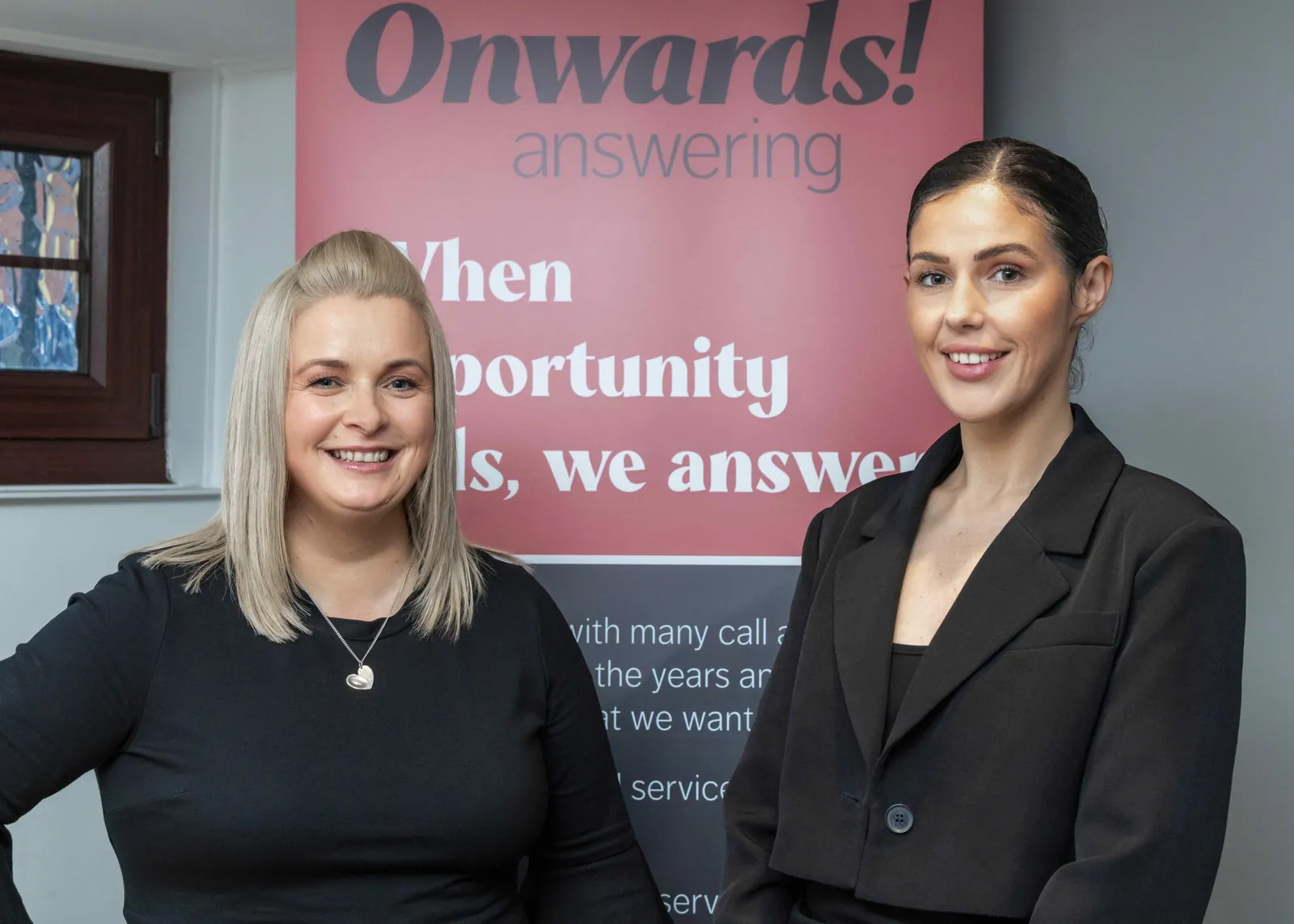 Receptionist with a headset taking a call for an accountancy firm